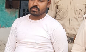 कलियागंज नाका पर वाहन जांच के दौरान युवक गिरफ्तार, बाइक से नेपाली शराब बरामद